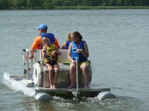 Seth taking the girls out on the pedal boat