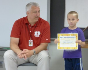 Adam receiving his 'Student of the Week' award from Principal Knorr!