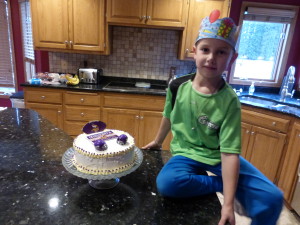 Adam with his crown from school and his surprise cake I made him!