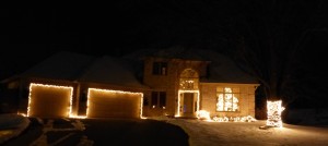 View of our house from the street. Can even see the fat tree through the window!