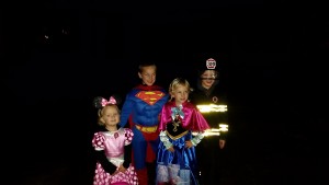 We met up with our neighbors while trick or treating! Kelsey as Anna and Colin as a fireman!
