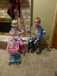 Santa came! They were so excited! Adam got Pokemon cards and Allison got a shopping cart